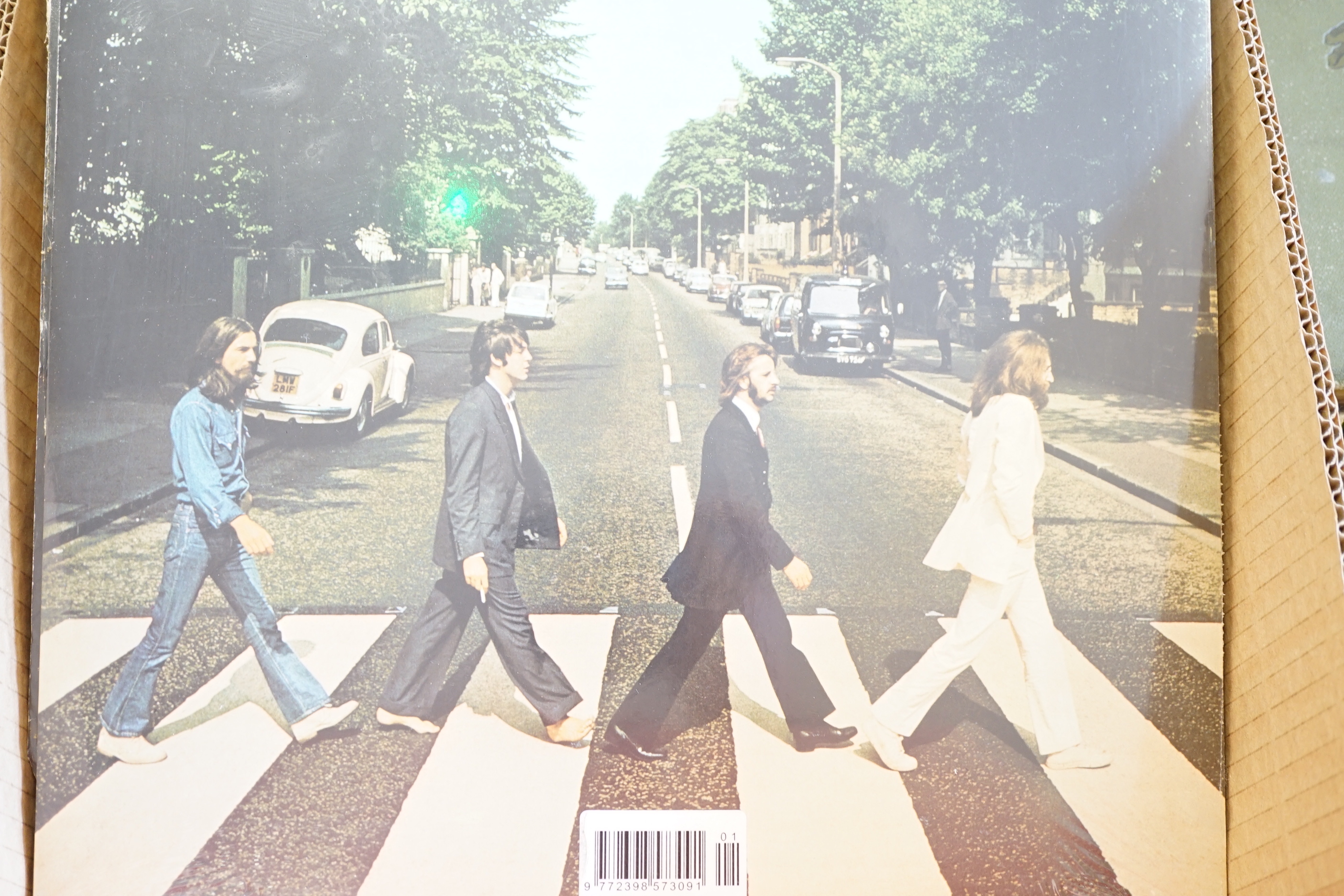Nineteen sealed album re pressings, 1960’s & 1970’s rock to include The Beatles, David Bowie, Rolling Stones etc.